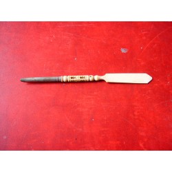 Antique ivory letter opener and quill.